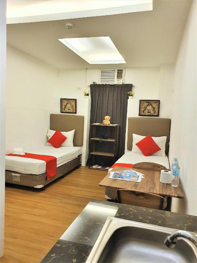Spiral Suites Hotel Кесон-Сити Экстерьер фото